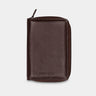 Nordweg Nomad leather passport wallet in coffee, front view with zip-around closure