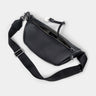 Black Pulse leather sling bag angled back view with strap and key detail