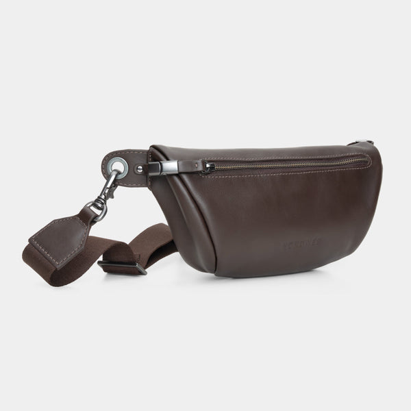 Nordweg Pulse leather sling crossbody bag in coffee, angled front view with strap and key tag