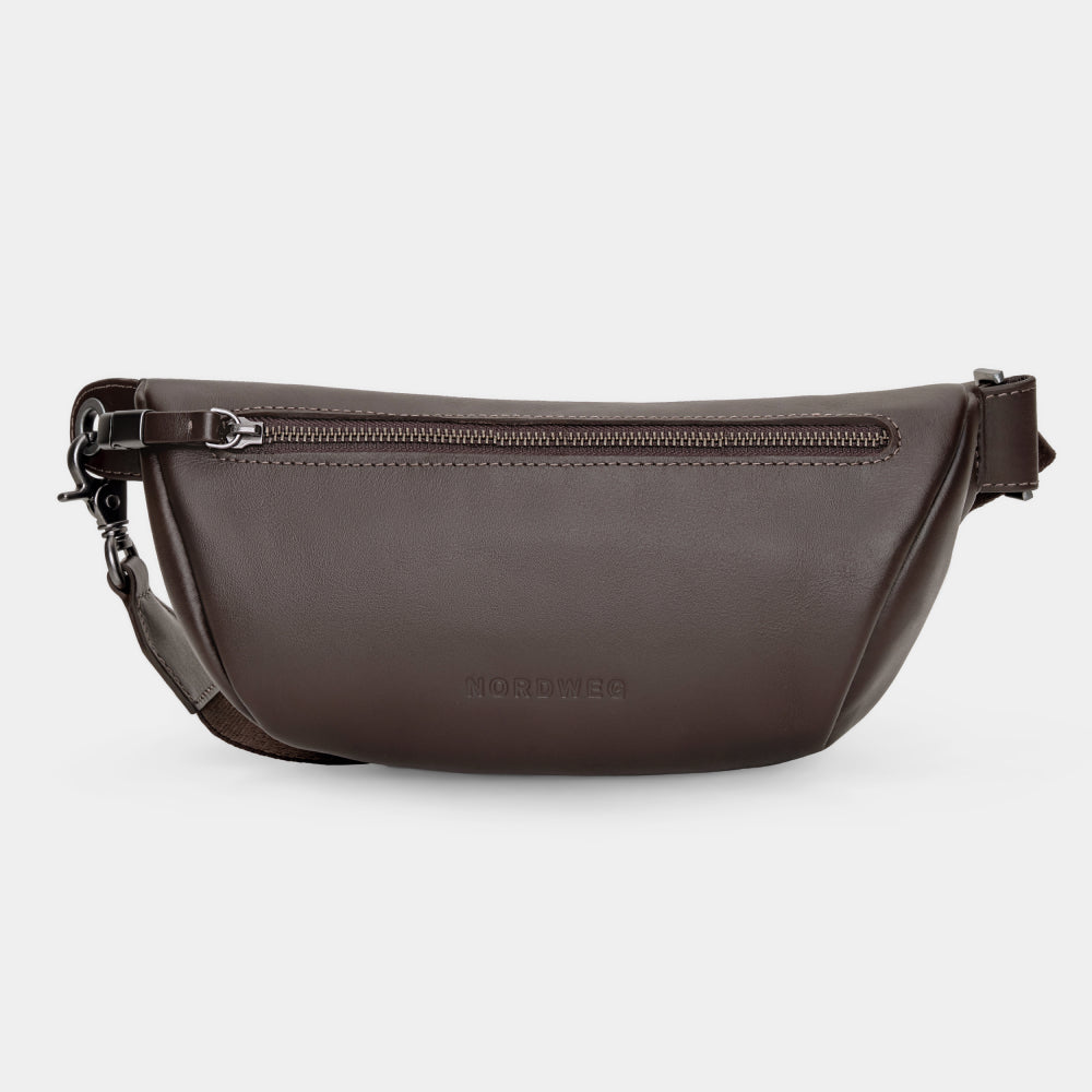 Nordweg Pulse leather sling crossbody bag in coffee, front view with zip pocket