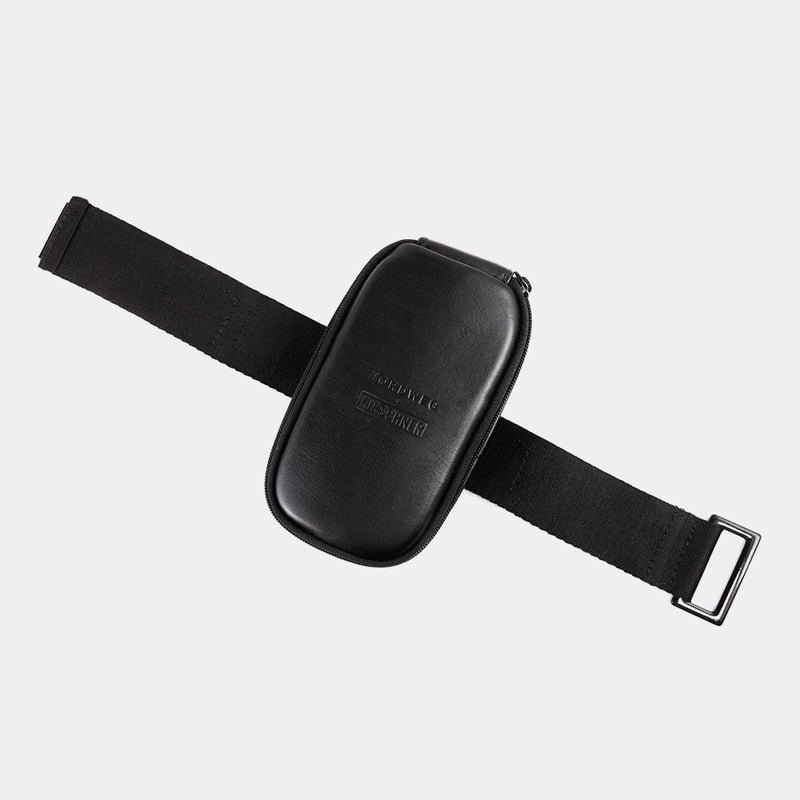 Black Nordweg Serra leather bicycle saddle bag detail showing the saddle strap and metal buckle, SKU NW090.IP, GTIN 7898571000948