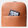 Caramel Slim Workplace backpack showing a tablet in the front pocket