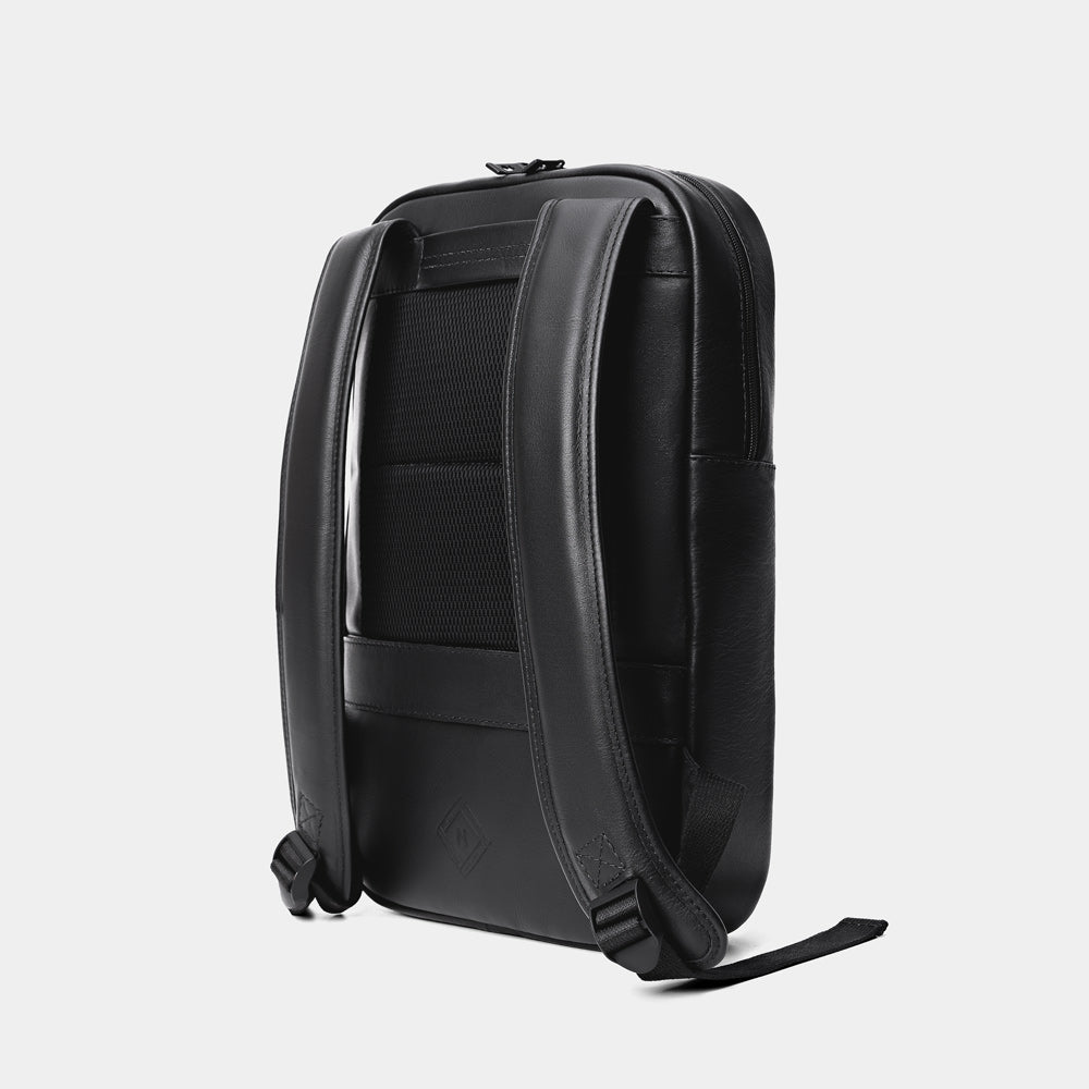 Nordweg Slim Workplace leather laptop backpack in black, angled back view