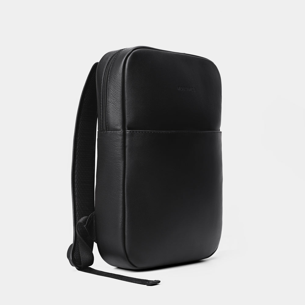 Nordweg Slim Workplace leather laptop backpack in black, angled front view