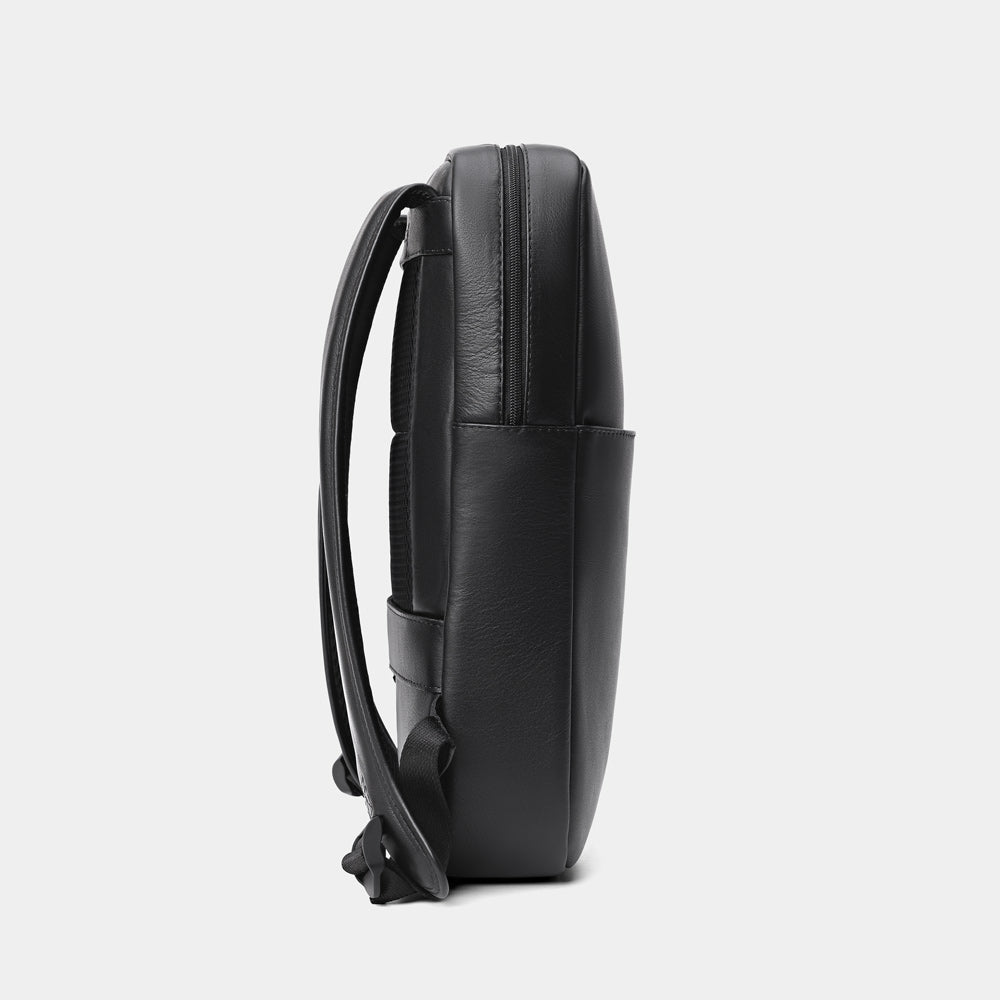 Nordweg Slim Workplace leather laptop backpack in black, slim side profile