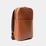 Nordweg Slim Workplace leather laptop backpack in caramel, angled front view