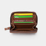 Open caramel Traveler Pro AirTag leather wallet showing card slots and cash pocket