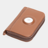 Caramel Nordweg Traveler Pro AirTag leather wallet, angled view with round AirTag holder