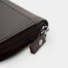 Nordweg Traveler Pro AirTag Wallet in Coffee, zipper pull and closure detail, product-only gray studio view
