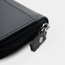 Black Nordweg Traveler Pro wallet zipper and leather stitching detail