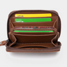 Top-down view of the open Nordweg Traveler Pro Wallet in Caramel with cards visible inside.