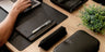 Black Nordweg Workplace leather desk pad with a pen case, laptop, and workspace accessories, SKU NWA07.IP, GTIN 7898571001303