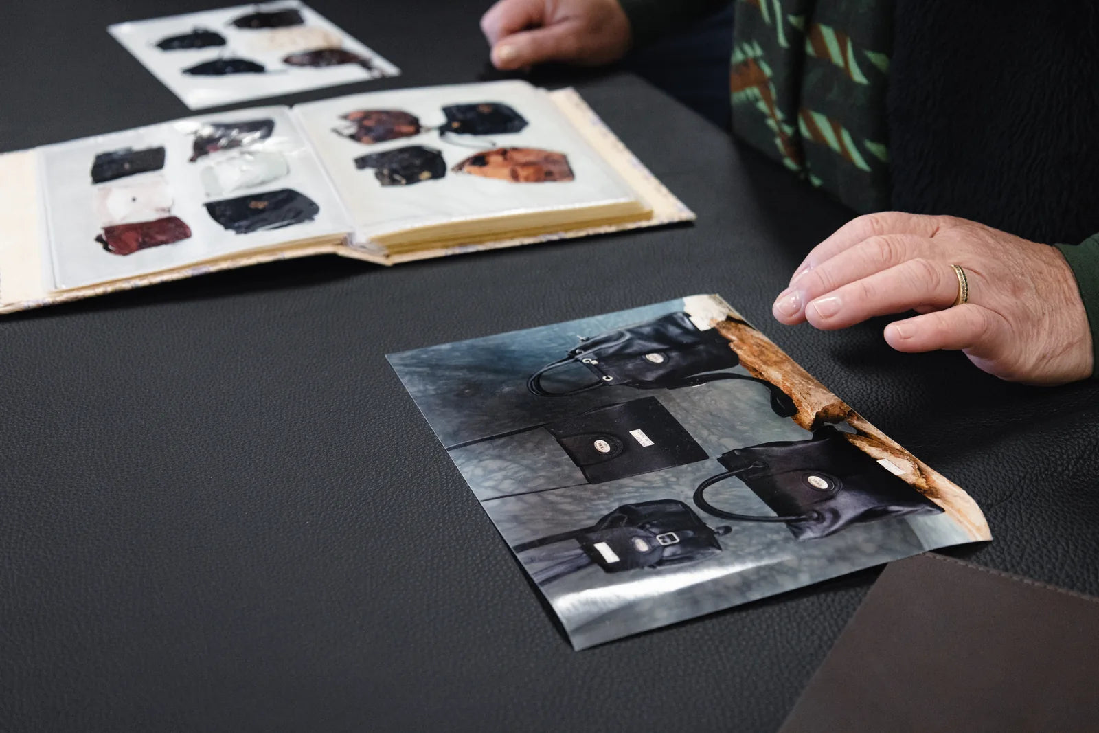 Photographs of early Emme handbag designs in the family archive