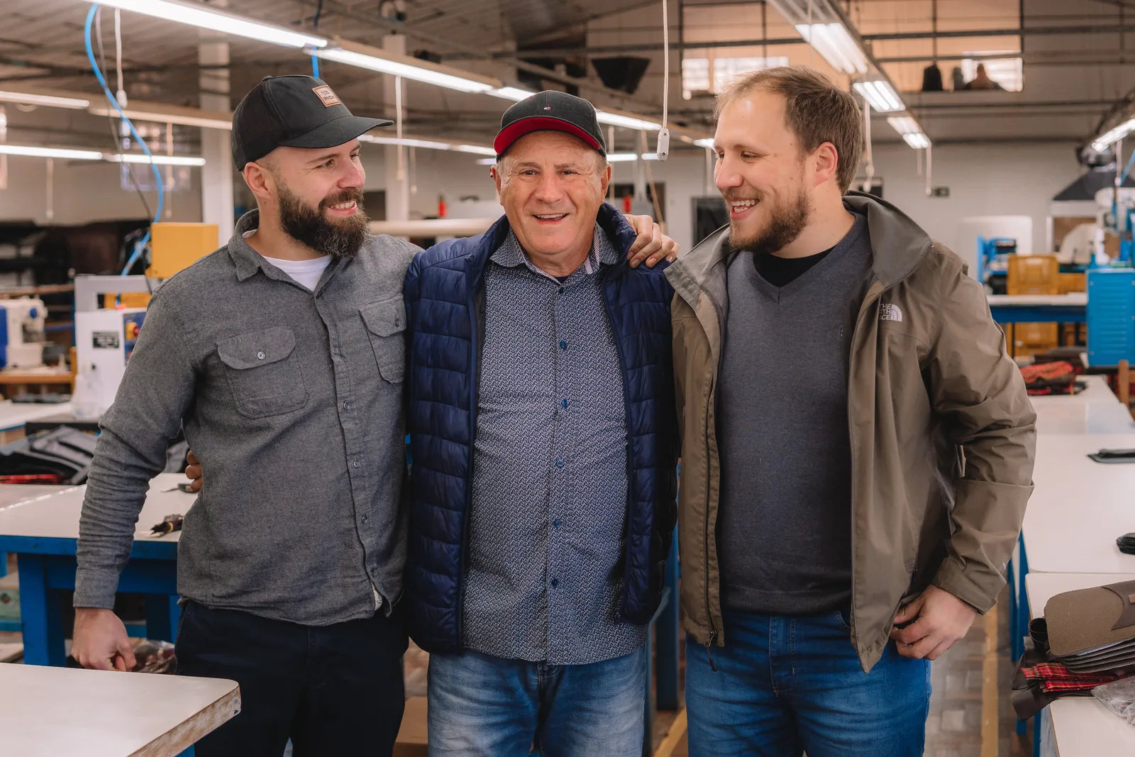Igor and Iuri with their father in the workshop
