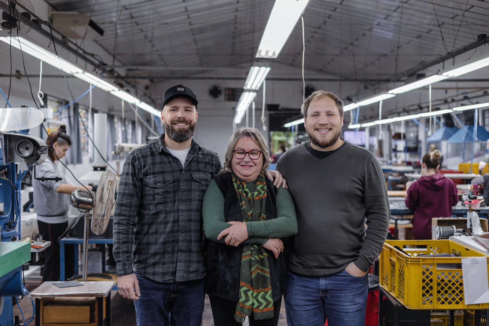 Igor, Iuri and their mother Marisa together in the workshop